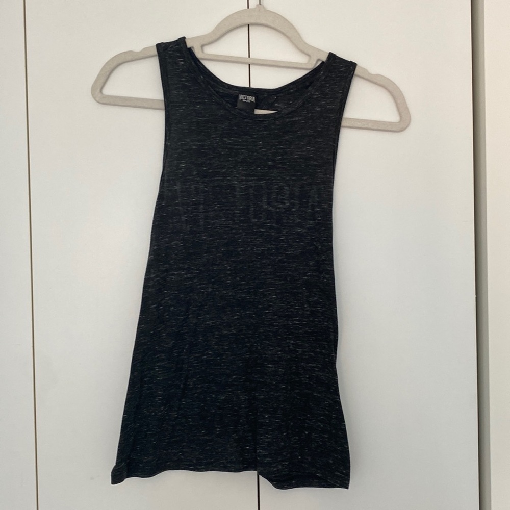 Victoria Sport athletic tank. Tie back with moderate exposure. Full length. Sm.